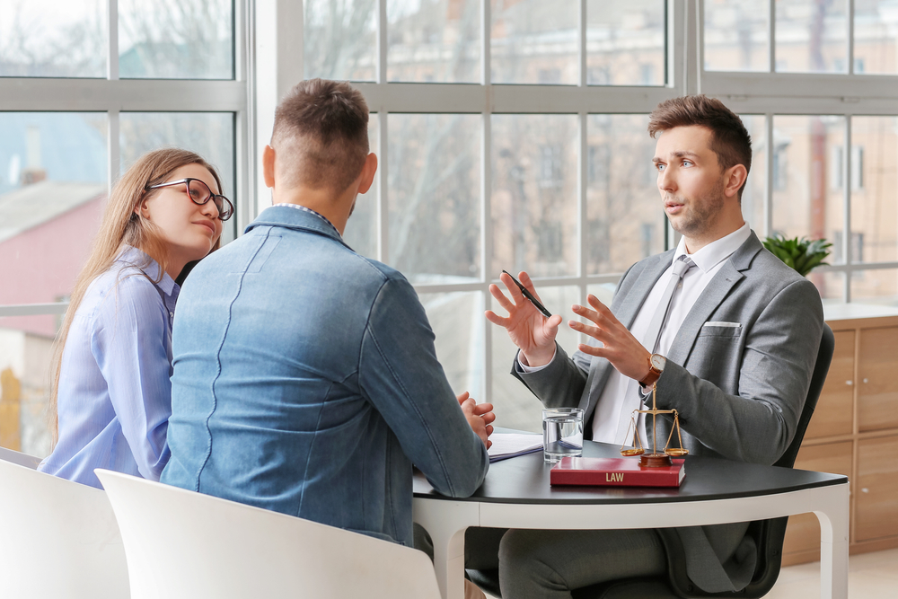 Photo of people sitting at the table and talking